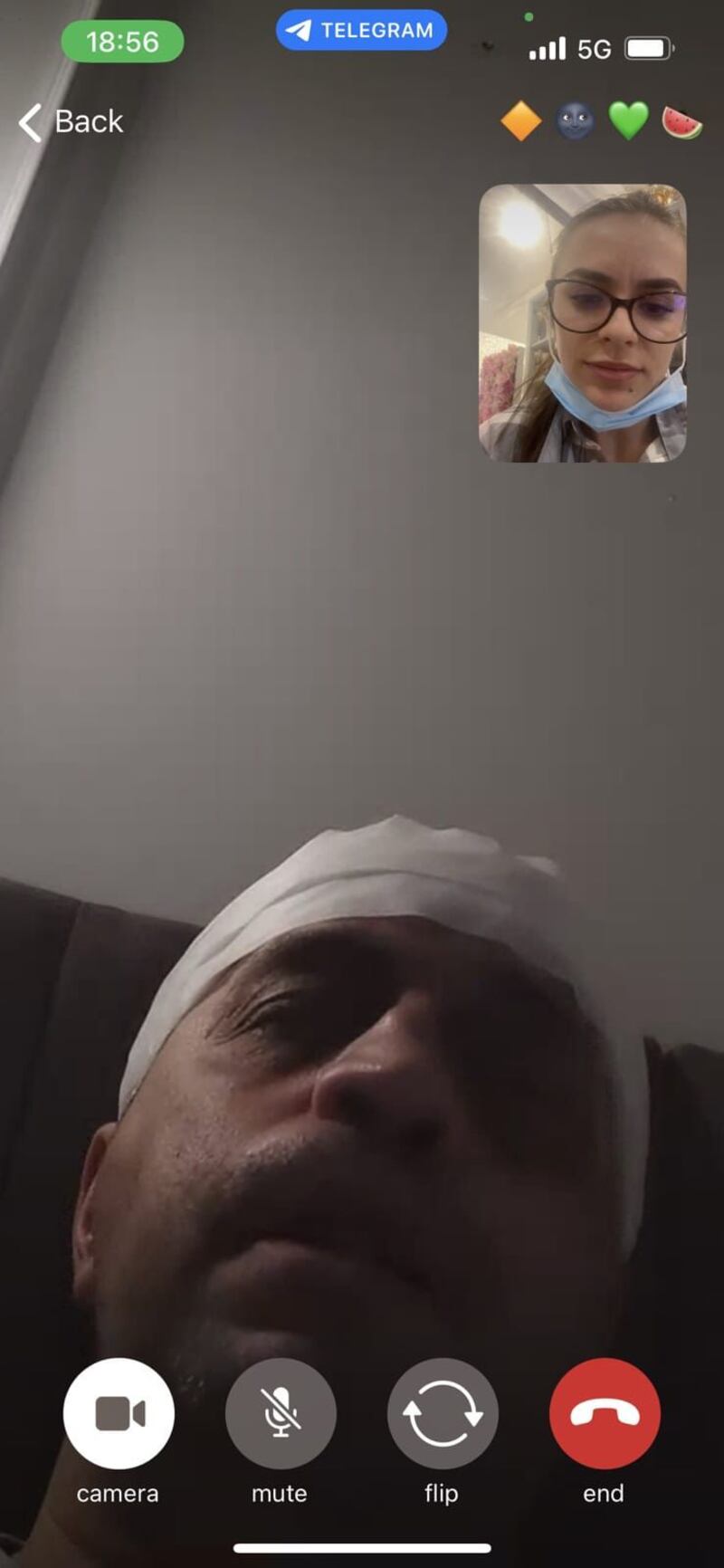 A screengrab from the social media network Telegram of Biser Dzhambazov, with what appears to be toilet paper wrapped round his head, on a video call with Vanya Gaberova