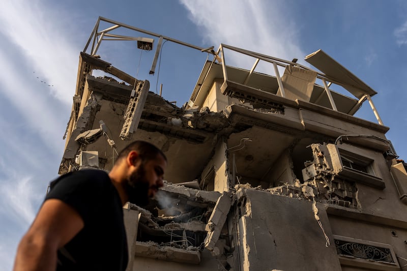 A damaged building where emergency services said 11 people were hurt in a direct strike by projectiles fired from Lebanon after it hit a home in Tira, Israel (Ariel Schalit/AP)