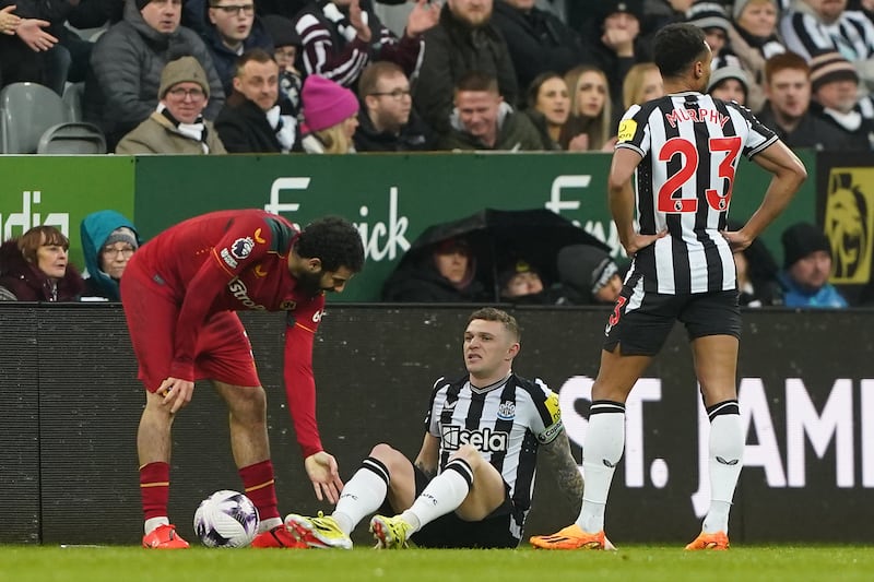 Newcastle defender Kieran Trippier (centre) suffered a calf injury against Wolves in March