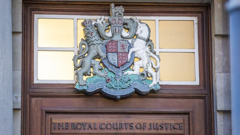 File photo dated 07/11/2022 of the crest of the Royal Courts of Justice where the High Court and the Court of Appeal sit in Belfast, Northern Ireland.