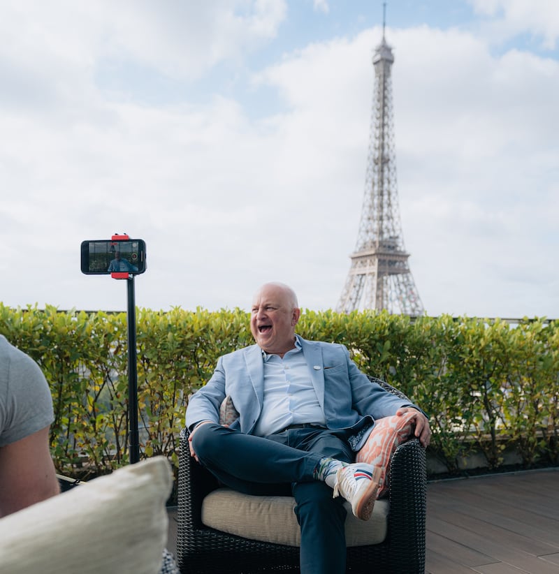 Dave Guenther, seen here sat on the balcony of a Shangri-La Paris’ suite, is founder and president of Roadtrips (Caleb Snider/Roadtrips)