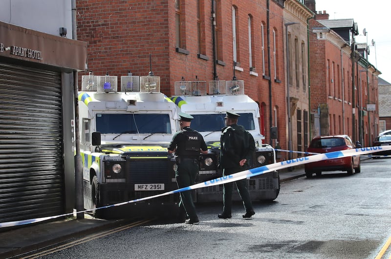 the scene of a murder in the Harvey Street area of Derry city on Saturday. A womans body was discovered in a house after a fire in the building. Picture Margaret McLaughlin  24-8-2024