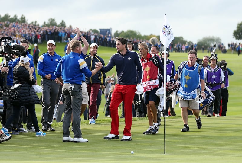 Europe’s Jamie Donaldson (left) wins his match with Keegan Bradley on day three of the 40th Ryder Cup at Gleneagles