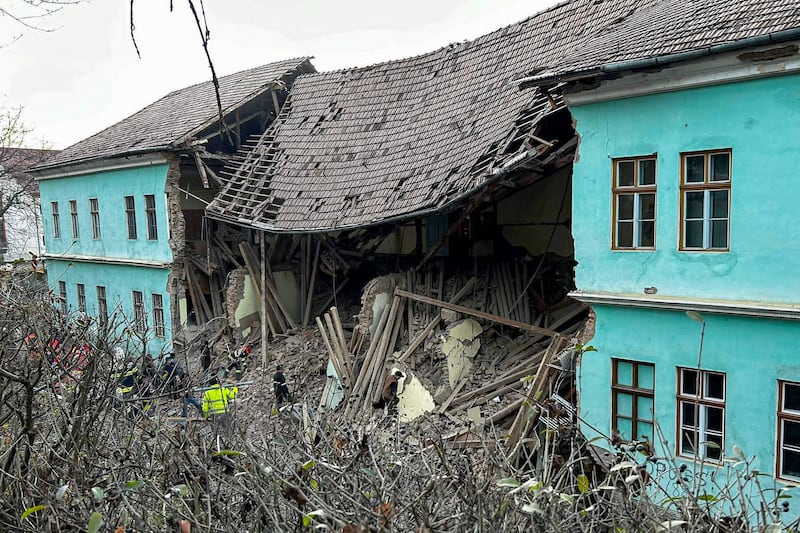 One person died when the school collapsed (Romanian Emergency Services – ISU Harghita/AP)