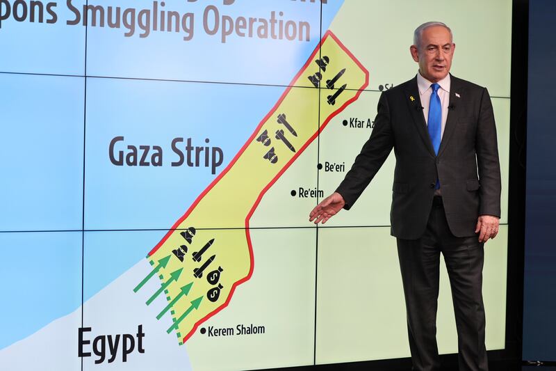 Israeli Prime Minister Benjamin Netanyahu in front of a map of Gaza during a press conference at the Government Press office in Jerusalem on Wednesday (Abir Sultan/Pool via AP)