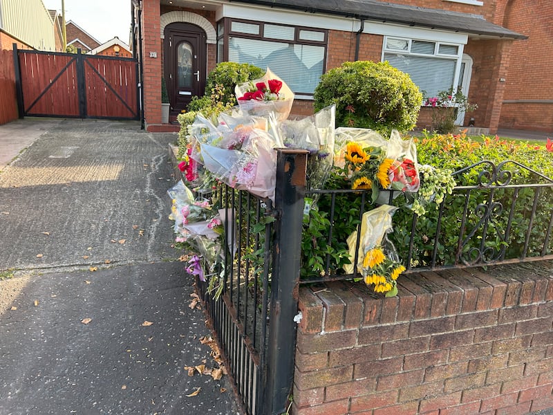 PACEMAKER BELFAST  19/08/2024
Floral tributes continue to grow at the home of Rachel Simpson, who was murdered here last weekend. Her son Nathan has been charged with her murder. Rachels funeral taks place next Wednesday 25th October.