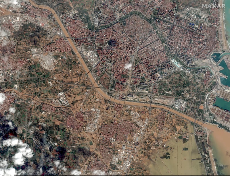 This satellite image released by Maxar Technologies shows mud caused by floods across Valencia, Spain (Satellite image ©2024 Maxar Technologies/AP)