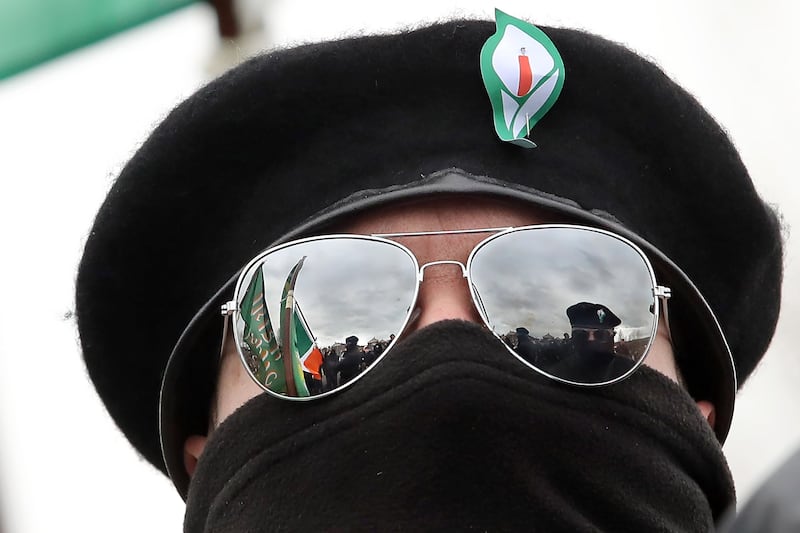 The colour party during the Easter Monday dissident republican parade through the Creggan estate to the City Cemetery in Derry. NO BYLINE /  1-4-2024 MML