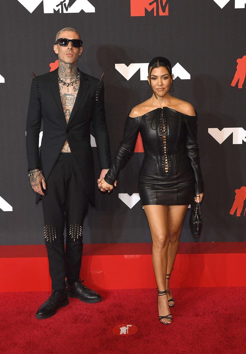 Travis Barker and Kourtney Kardashian have become synonymous with couple dressing