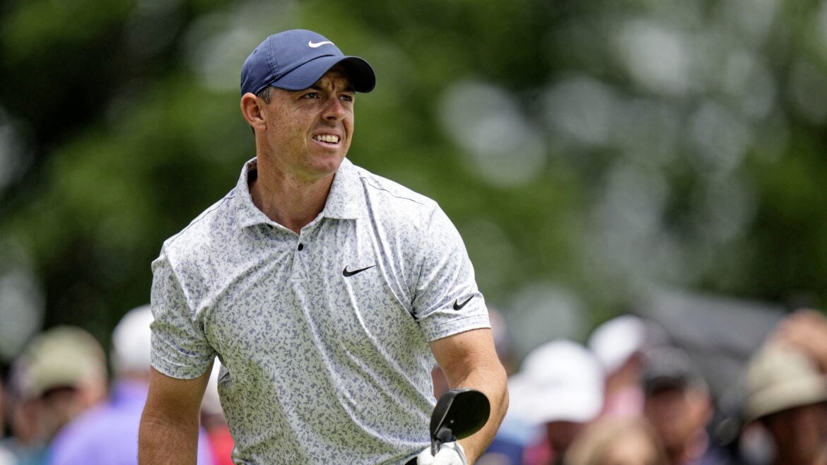 Rory McIlroy watches his tee shot on the first hole during the first round of the Travelers Championship golf tournament at TPC River Highlands, Thursday, June 22, 2023, in Cromwell, Conn. (AP Photo/Frank Franklin II) 