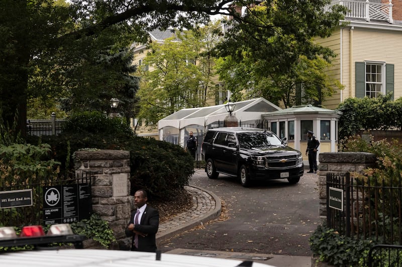 A vehicle drives out of Gracie Mansion, the official residence of New York City mayor Eric Adams, in New York (Yuki Iwamura/AP)