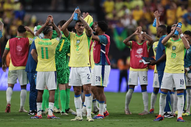 Players of Brazil celebrate their team’s 4-1 victory (L E Baskow/AP)