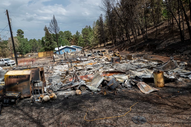 The remains of a house destroyed by the South Fork Fire (Andres Leighton/AP)