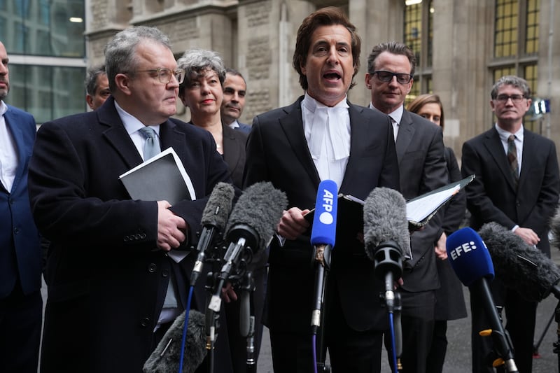 David Sherborne, right, speaking to the media outside the Rolls Building in London following the settlement