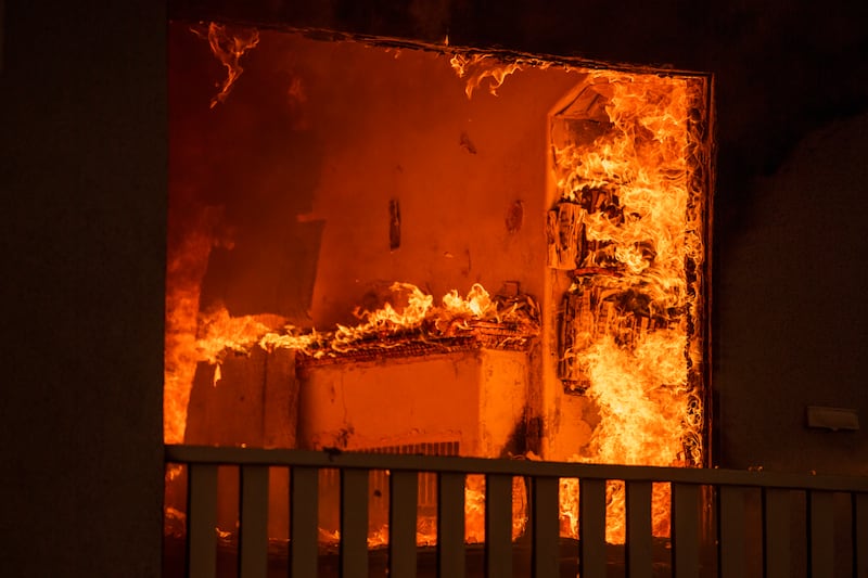 A house burns in the Eaton Fire in Altadena, California (AP Photo/Nic Coury)