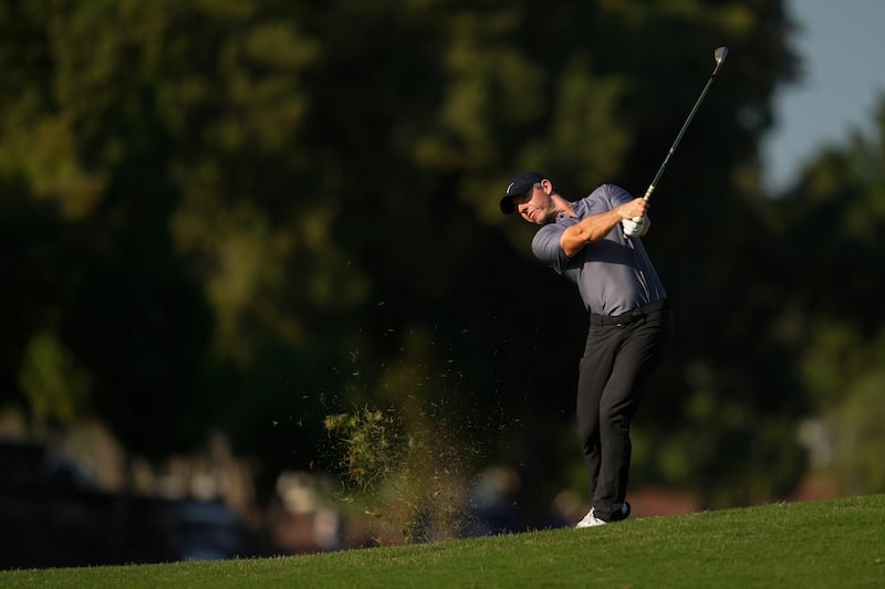 Rory McIlroy plays his second shot on the 14th hole during the second round of the DP World Tour Championship in Dubai