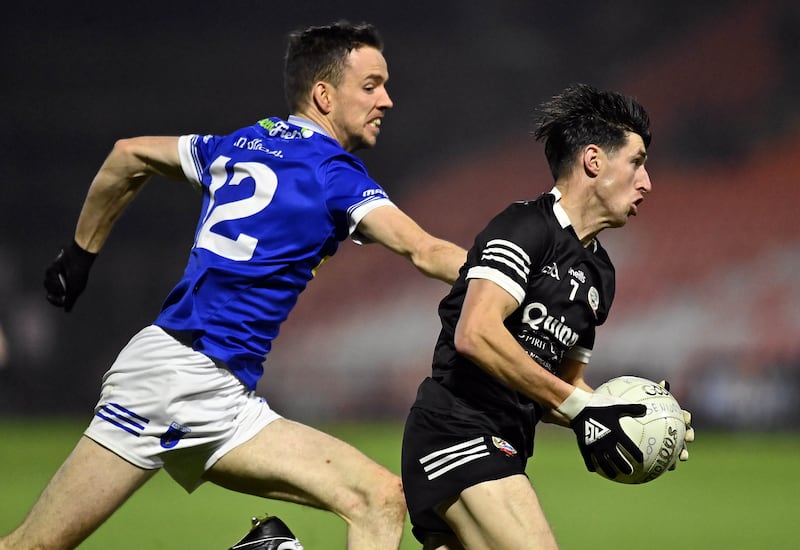 Kilcoo's Eugene Branagan gets away from James Hamill of Scotstown during Saturday's Ulster Club SFC semi-final at the BOX-IT Athletic Grounds
Picture: Oliver McVeigh