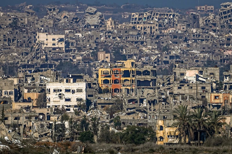 A destroyed part of Gaza City as seen from southern Israel (Tsafrir Abayov/AP)