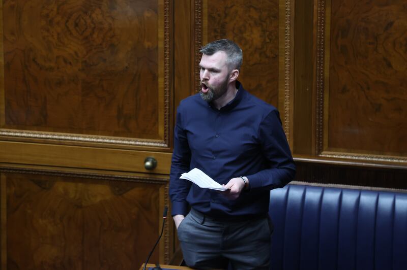 People Before Profit MLA Gerry Carroll speaking during proceedings at the Northern Ireland Assembly in Parliament Buildings, Stormont