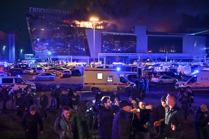 A man speaks to journalists after the incident (Dmitry Serebryakov/AP)