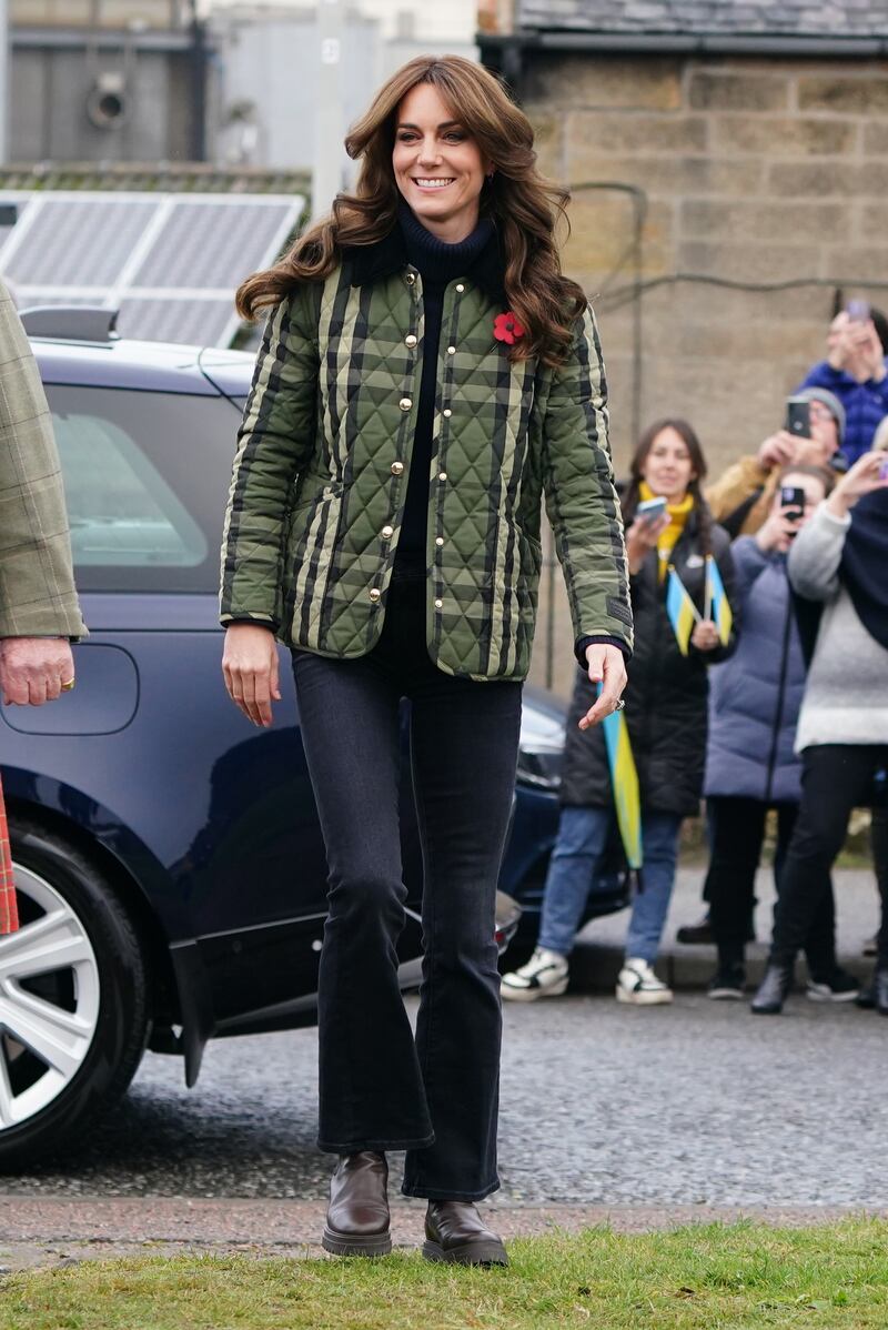 Kate keeps her outfit simple with roll necks and jeans when she wears a bold printed jacket