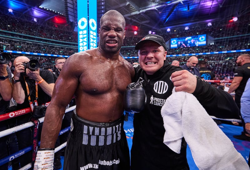 Daniel Dubois celebrates his fifth round stoppage of Anthony Joshua with Kieran Farrell. Picture: Mark Robinson Matchroom Boxing