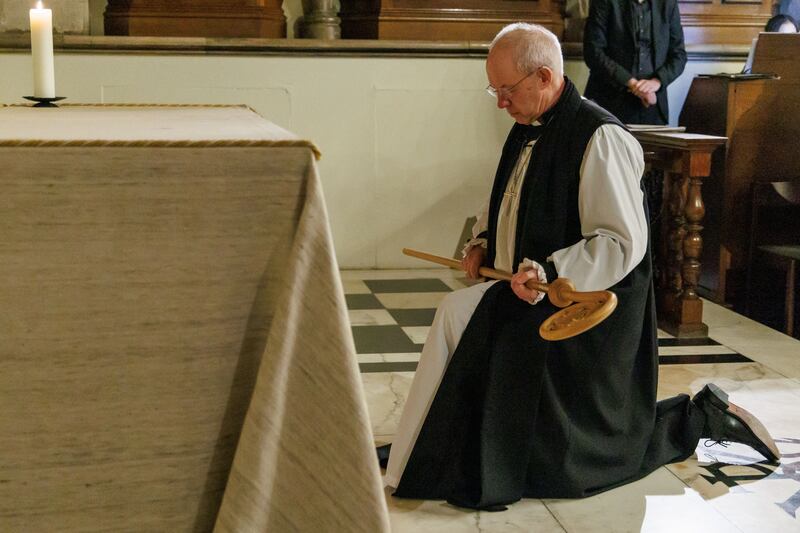 Mr Welby kneeling with the crozier in hand (Neil Turner/Lambeth Palace)