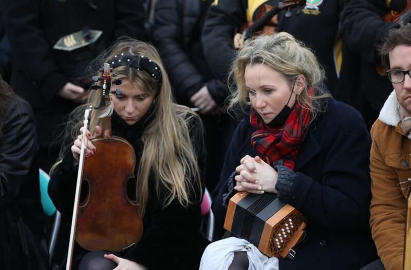 &nbsp;Traditional Irish musicians play outside St Brigid's Church, Mountbolus, Co Offaly, at the end of the funeral of Ashling Murphy, who was murdered in Tullamore, Co Offaly last Wedensday. 23-year-old Ashling