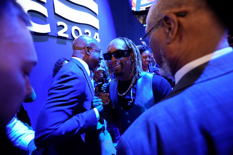 Lil Jon made a surprise appearance at the Democratic conference (AP Photo/Paul Sancya)