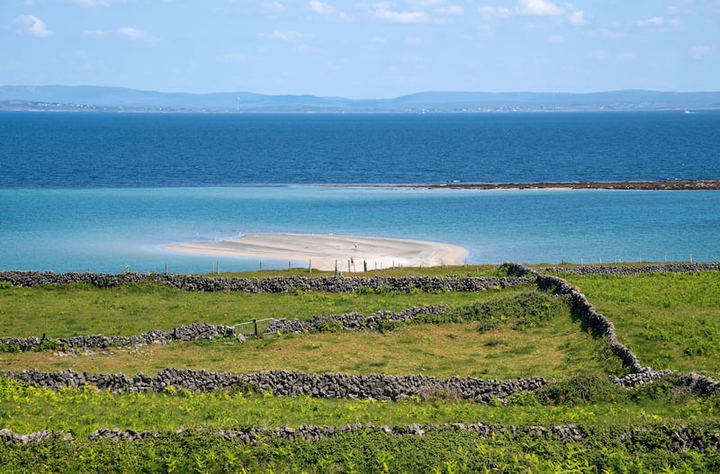 Tra Mor beach with large sand dunes with crystal clear waters, Inishmore, Aran Island, Ireland