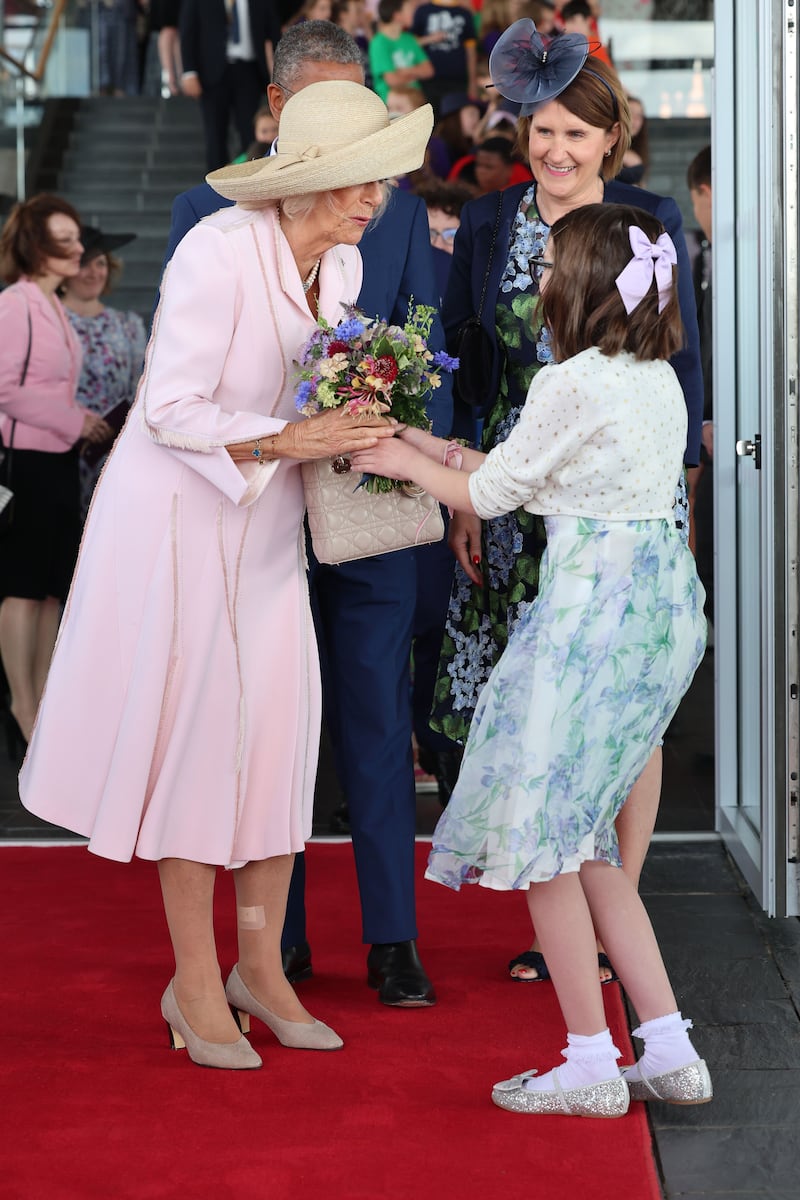 Camilla receives a bouquet of flowers