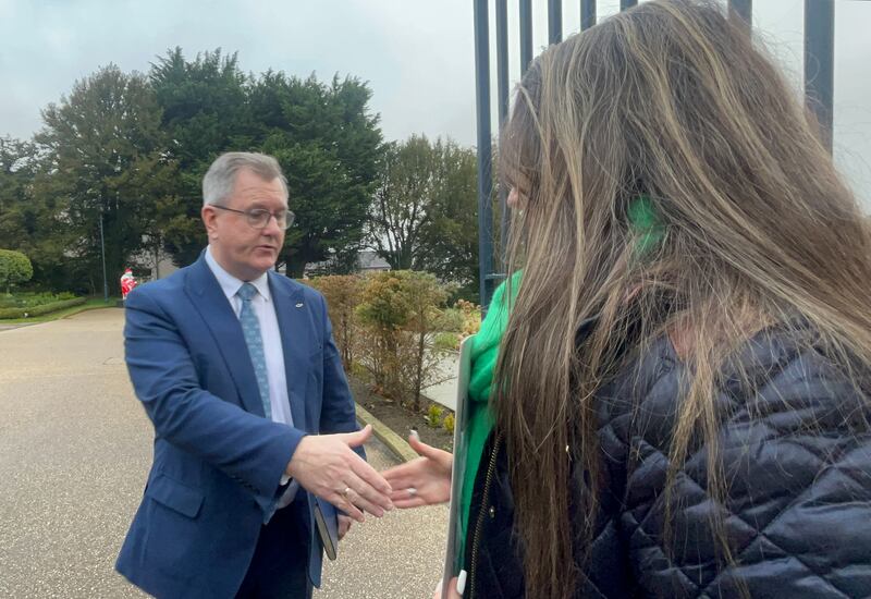 DUP leader Sir Jeffrey Donaldson greets Unison chairwoman Stephanie Greenwood outside Hillsborough Castle