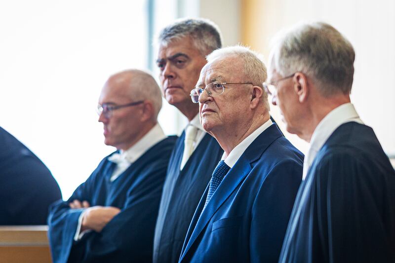 Former Volkswagen Group chief executive Martin Winterkorn, with his defence lawyers (Moritz Frankenberg/dpa/AP)