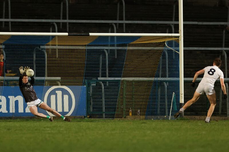 Ross Bogue stops a penalty kick from Kevin Feely