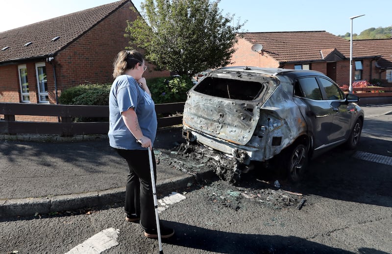 Leonie McLaughlin outside her home in the Drumahoe area of Derry where the family car was burnt out for the second time earlier this week. Leonie and her husband are now living in a hotel with their three young children while moving out of the house. Picture Margaret McLaughlin 19-9-2024