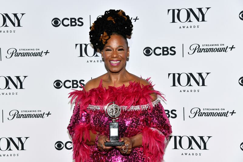 Kecia Lewis poses in the press room with the award for best performance by an actress in a featured role in a musical for Hell’s Kitchen (Evan Agostini/Invision/AP)