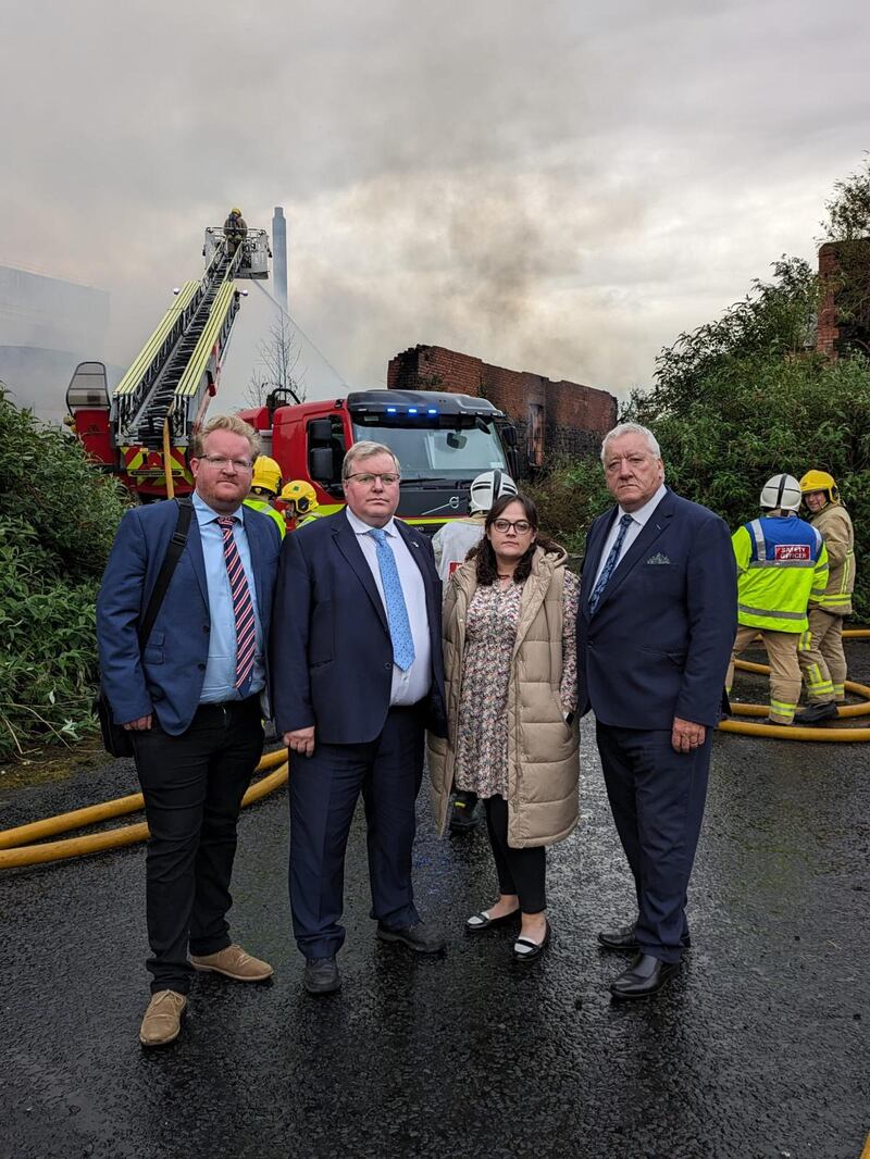 Lisburn councillors Gary Hynds, independent; Jonathan Craig, DUP; Nicola Parker, Alliance; and the SDLP's Pat Catney at Hilden Mill on Tuesday evening.