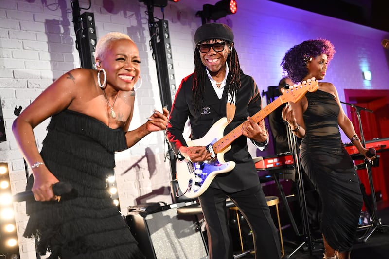 Nile Rodgers and Chic perform during an evening in London to celebrate 20 years of Virgin Unite