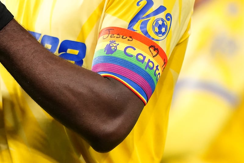 Close up of Crystal Palace’s Marc Guehi wearing the Rainbow Laces captain’s armband