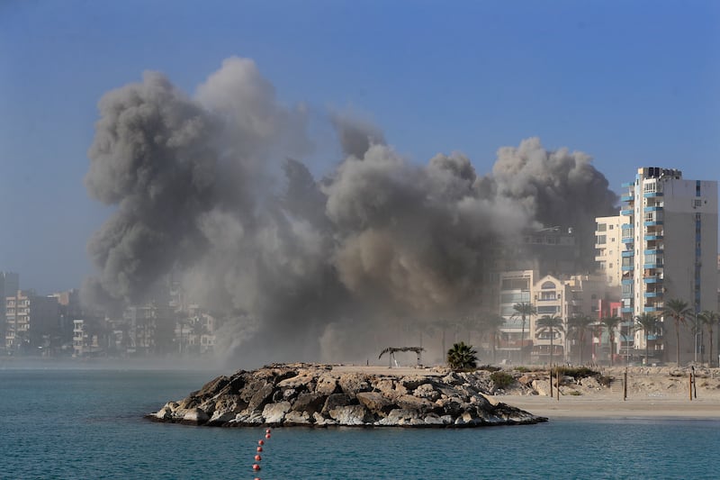 Smoke rises from buildings hit in Israeli airstrikes in Tyre, southern Lebanon (Mohammad Zaatari/AP)