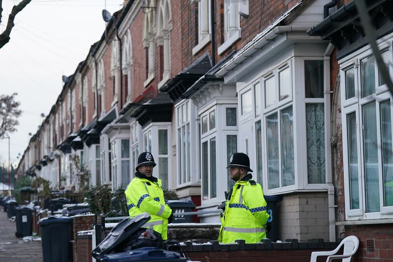 Police in Clarence Road, Handsworth, on December 13 2022