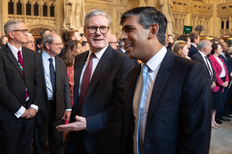 Prime Minister Sir Keir Starmer and leader of the Opposition Rishi Sunak walking through the Member’s Lobby