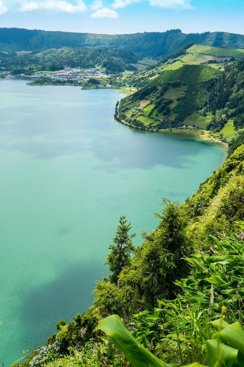 Sete Cidades, two lakes and a village in the dormant crater of a volcano on the island of Sao Miguel, The Azores