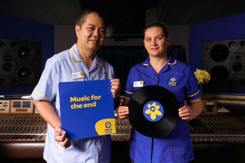 Marie Curie Nurse Raluca Aparaschivei and Healthcare Assistant Manny Miranda