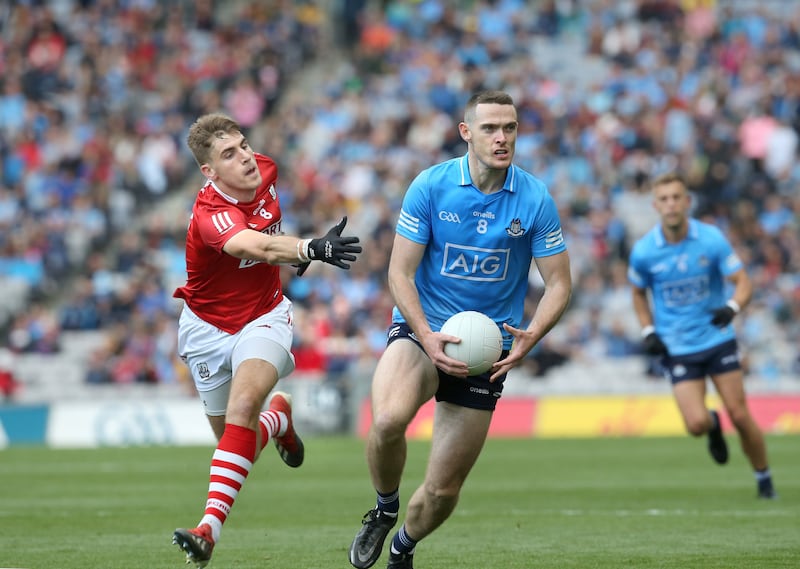 Ian Maguire chases down Dublin's Brian Fenton in a 2022 encounter.