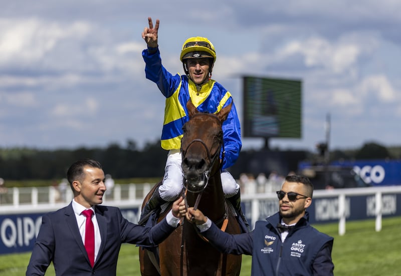 Goliath ridden by jockey Christophe Soumillon celebrates after winning the King George VI And Queen Elizabeth Qipco Stakes during the Qipco King George Day at Ascot Racecourse, Berkshire