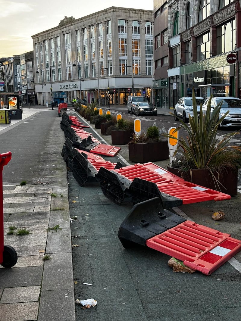 The safety barrier at Castle Place pictured after it collapsed into the road in recent high winds. PICTURE: BELFAST ONE