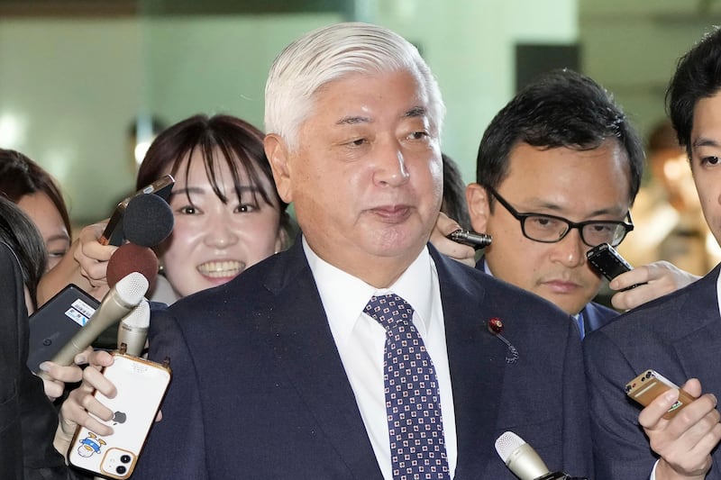 Japanese Defence Minister Gen Nakatani arrives at the prime minister’s office in Tokyo on Thursday (Kyodo News/AP)