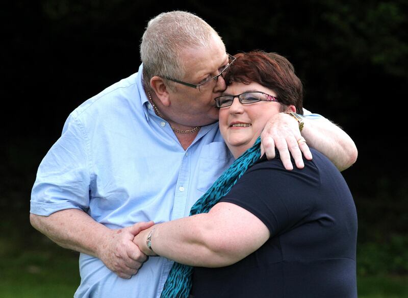 Colin and Chris Weir, from Largs in Ayrshire, celebrate during a photo call at the Macdonald Inchyra Hotel & Spa in Falkirk