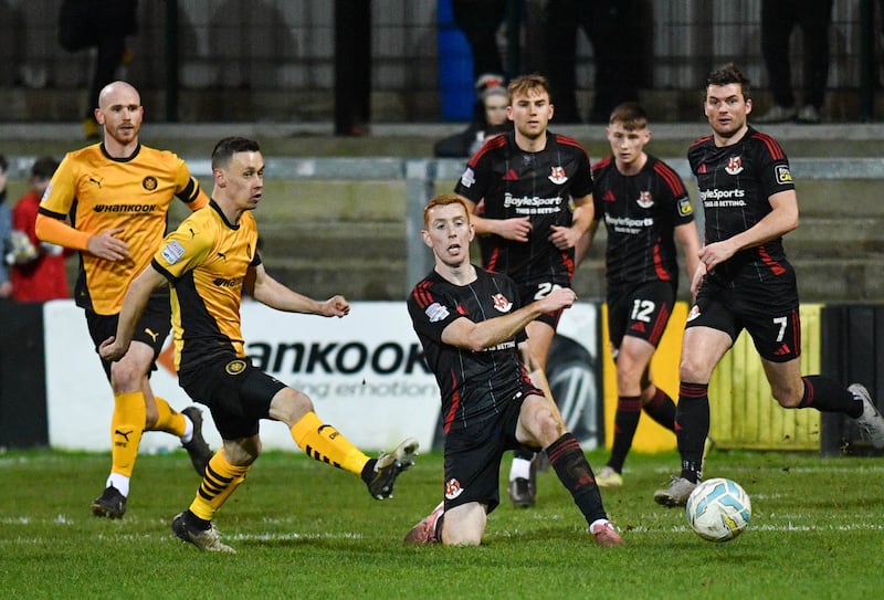 PACEMAKER PRESS BELFAST 30-12-24
Sports Direct Premiership
Match Day 24
Carrick Rangers v Crusaders
Paul Heatley of Carrick closes down Jarlath O'Rourke of Crusaders during this Evening’s game at Loughview Leisure Arena, Carrickfergus.

Photo - Andrew McCarroll/ Pacemaker Press